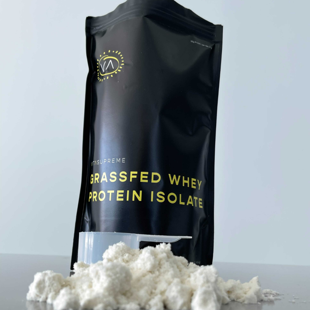 Organic Grass-Fed Whey Protein Isolate - Unflavored Image with Powder and a Scooper